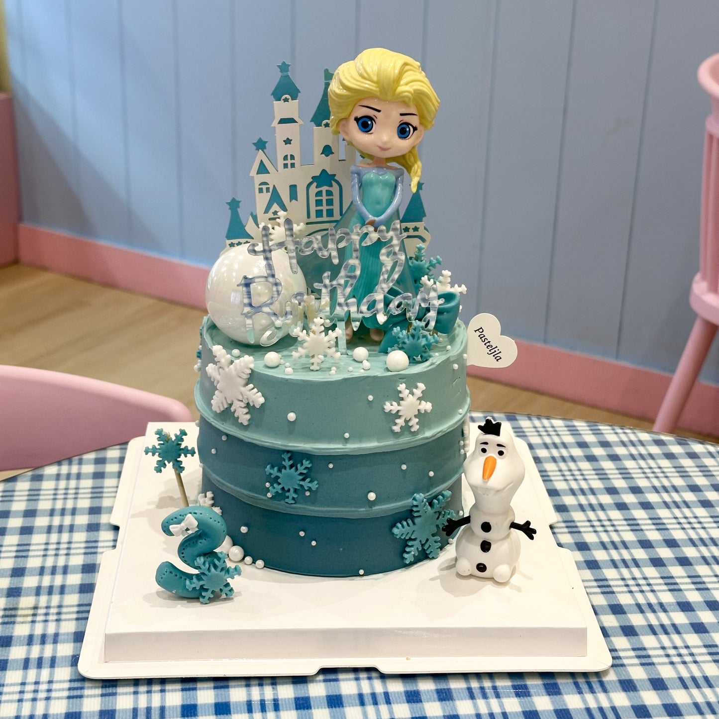 Blue frozen Elsa cake