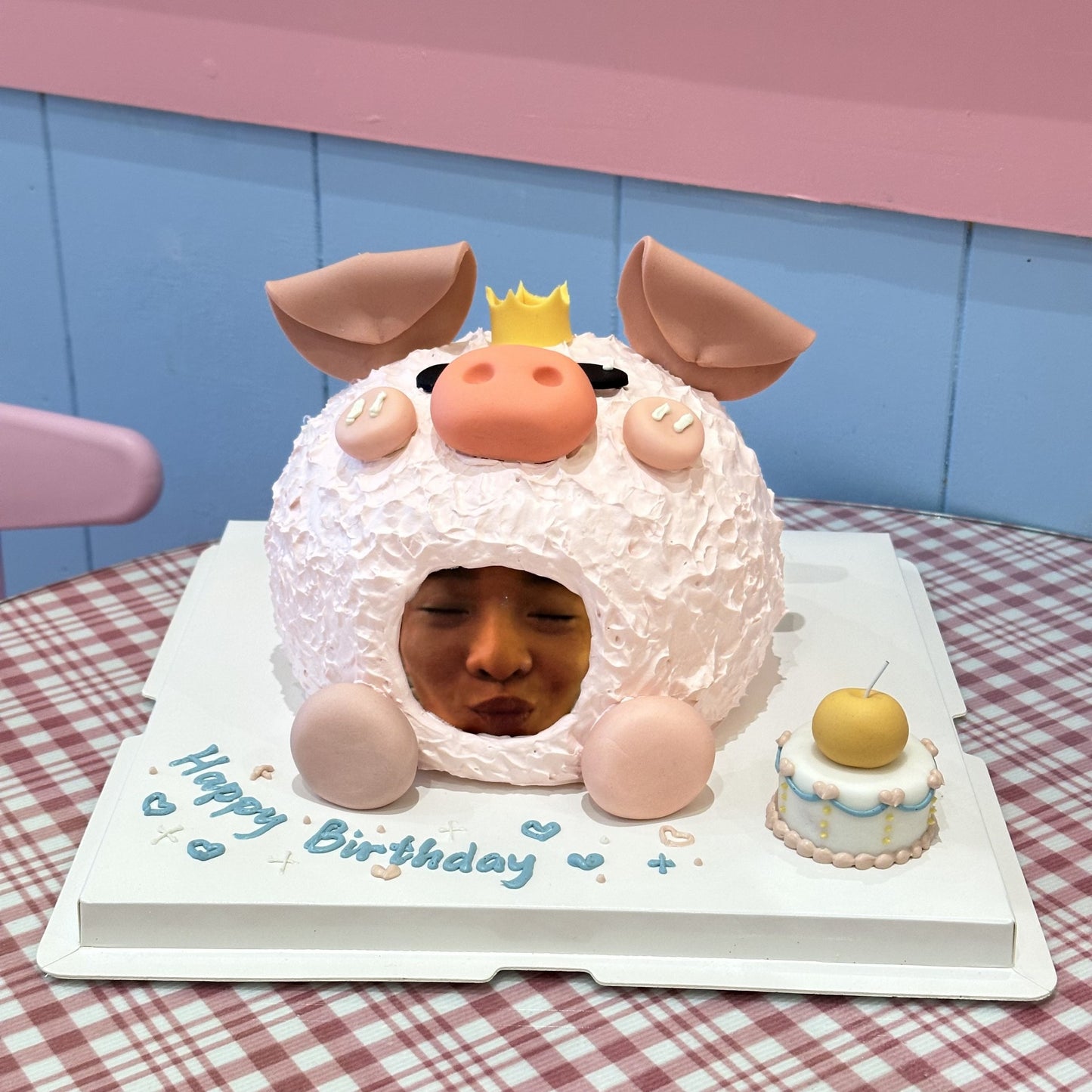 Funny pig cake with human face