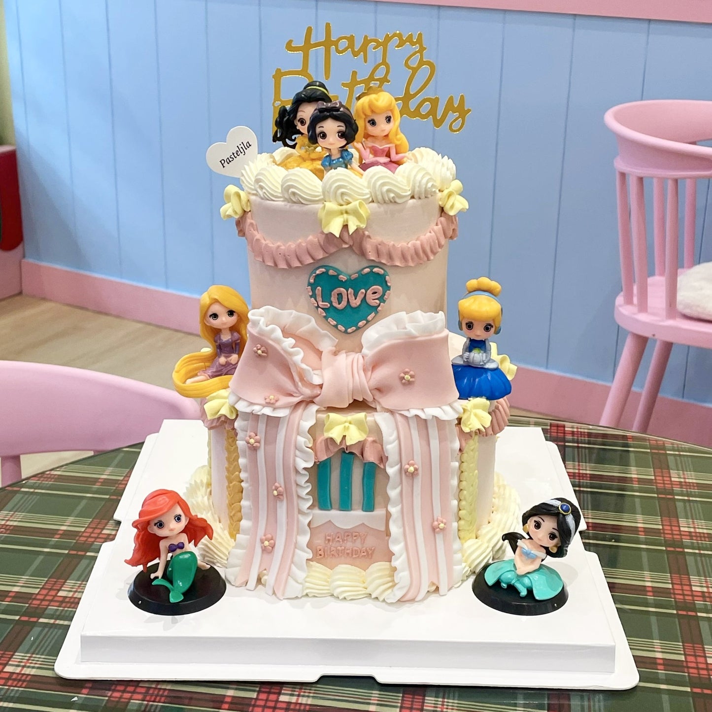 Two tier Disney princess cake