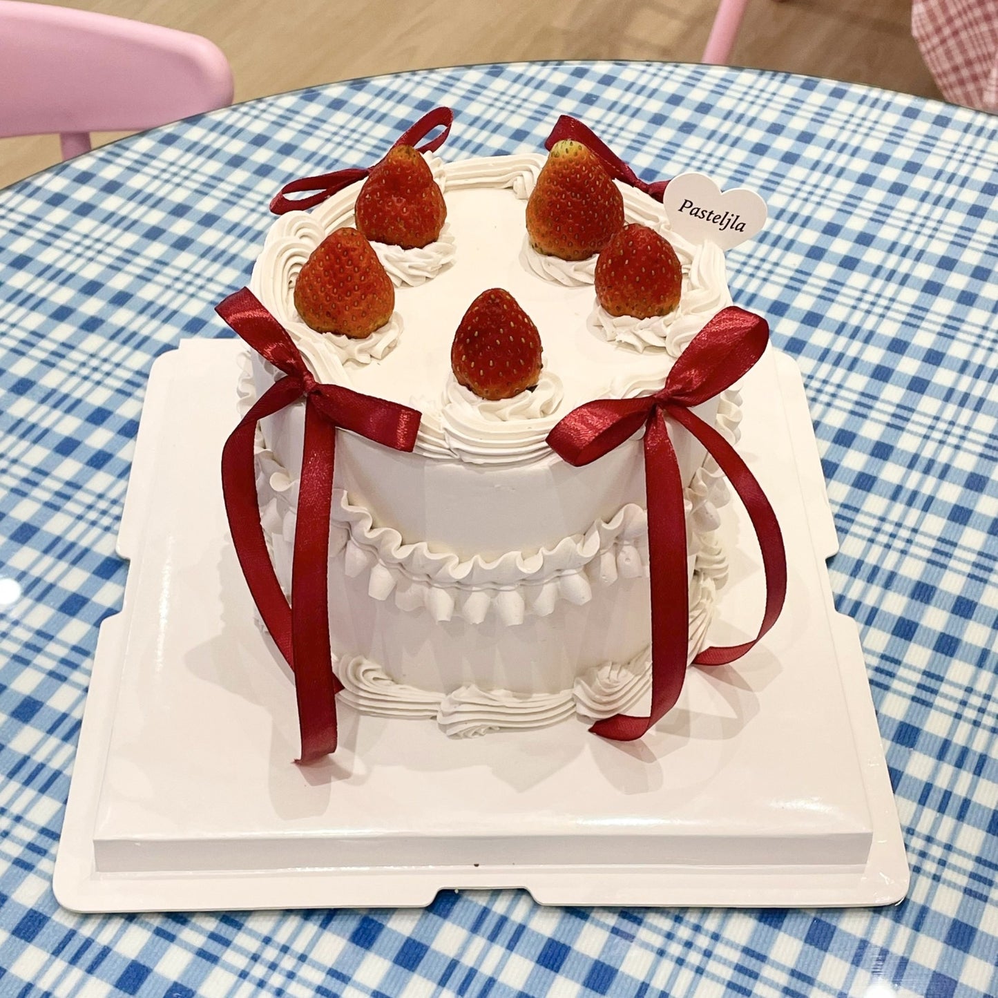 Red coquette strawberry cake