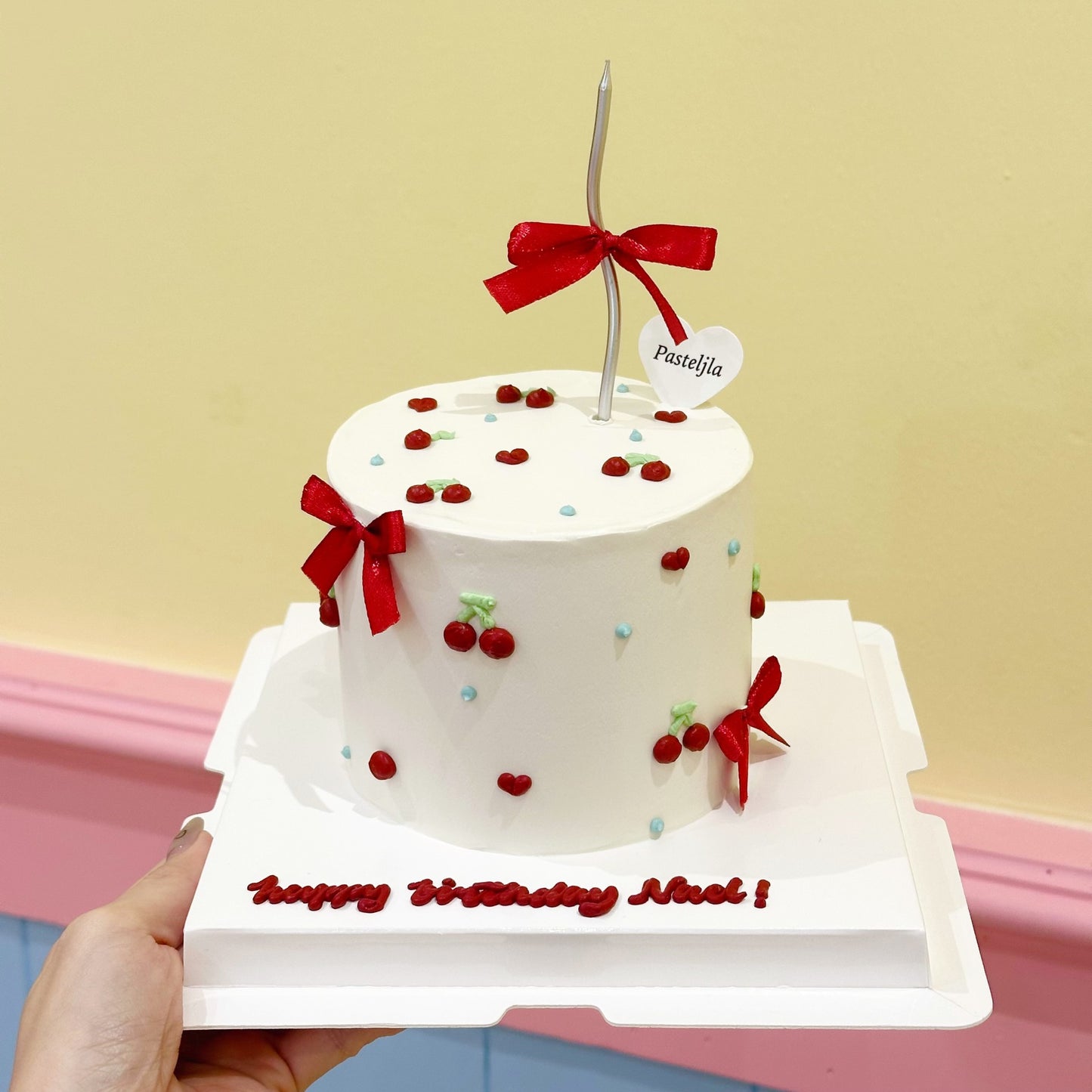 Red cherry ribbon cake