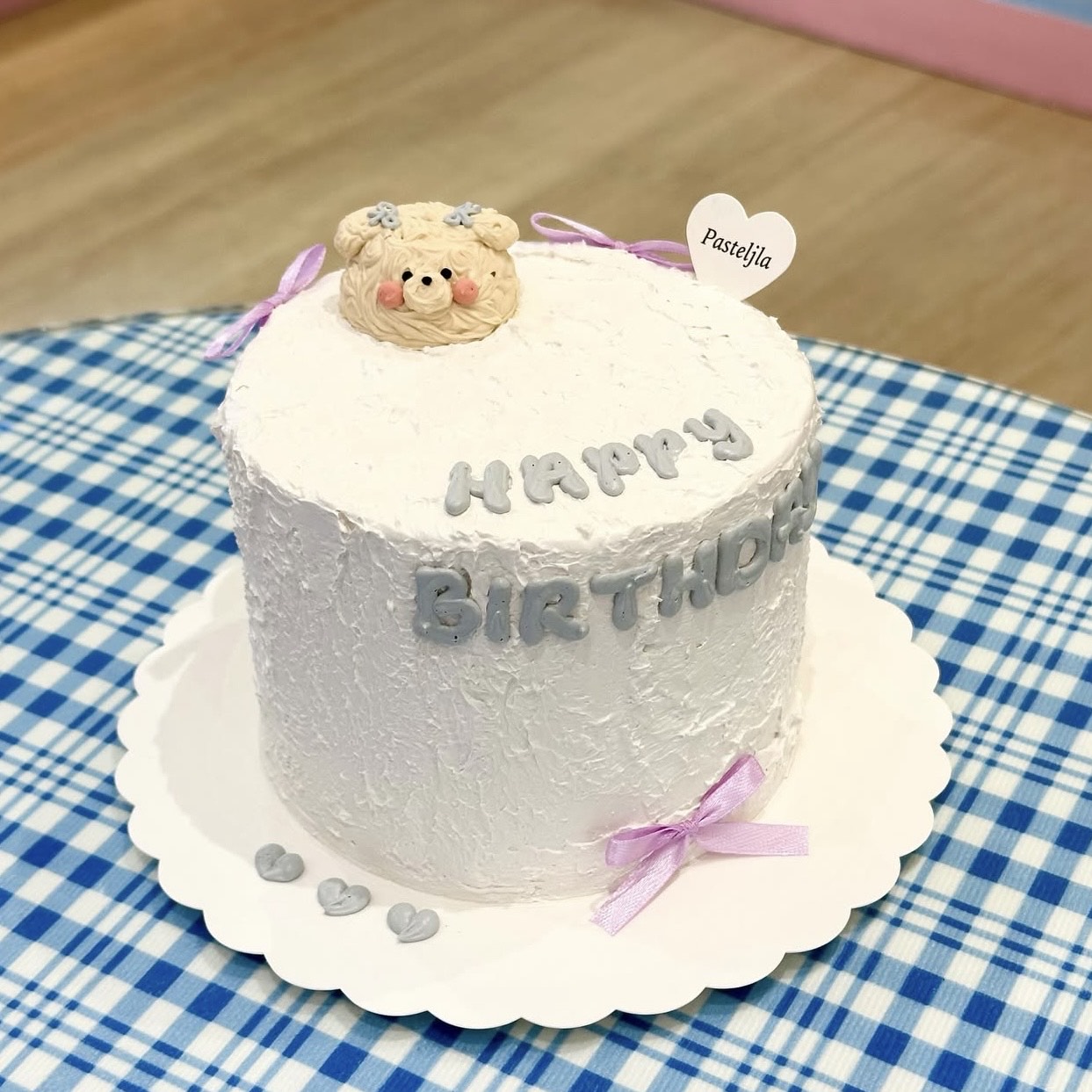 Purple and white bear cake