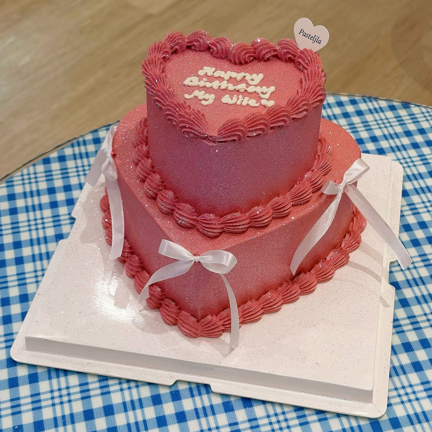Two tier pink glitter cake
