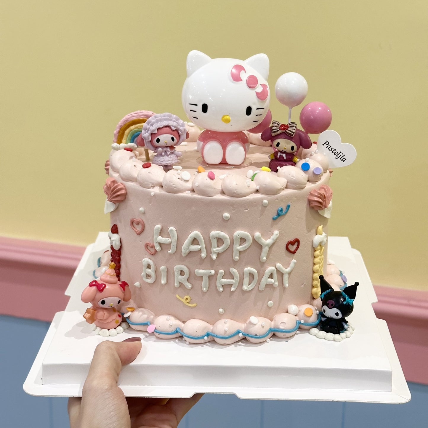 Pink hello kitty Sanrio cake