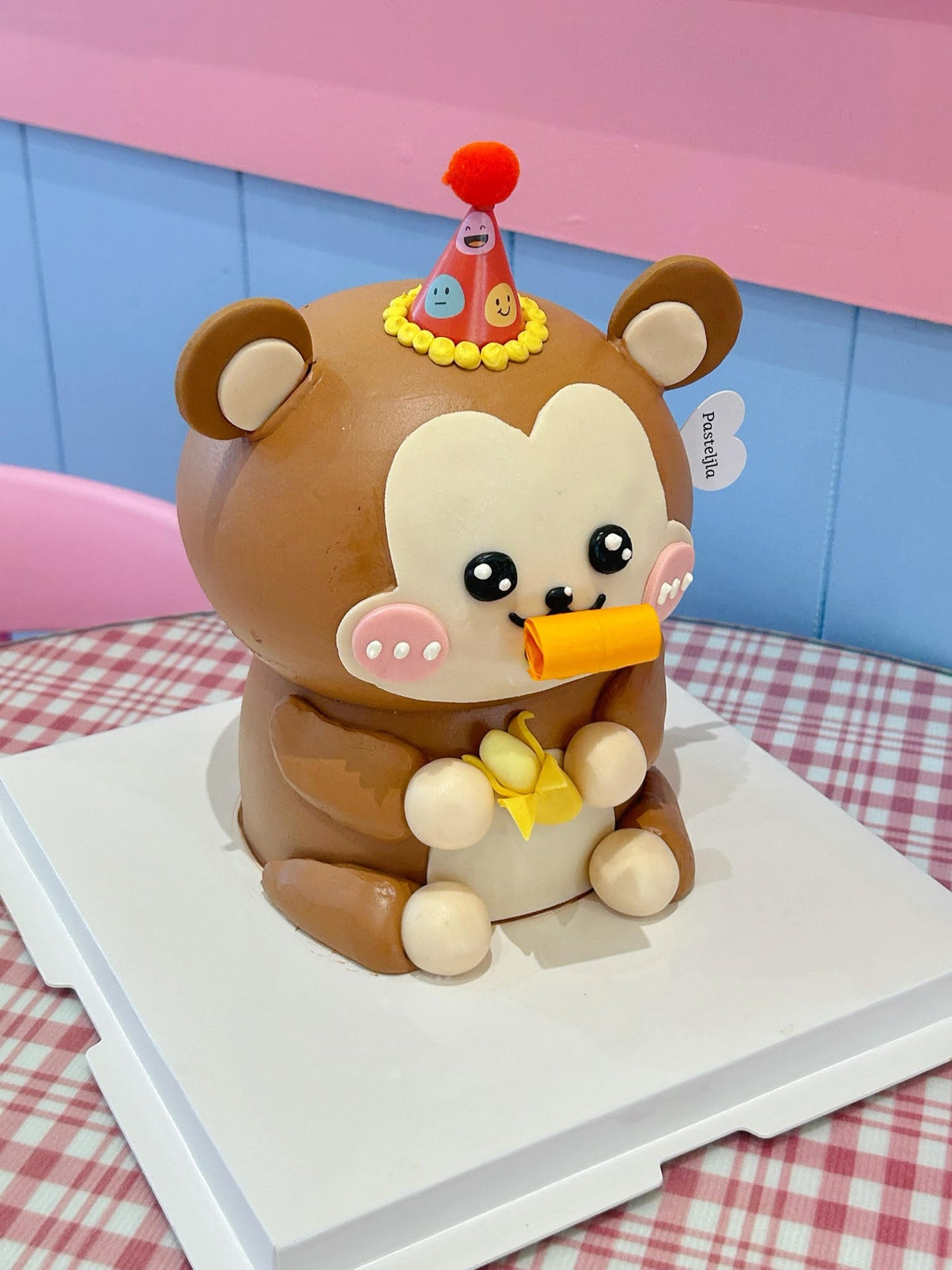 Monkey with party blower cake