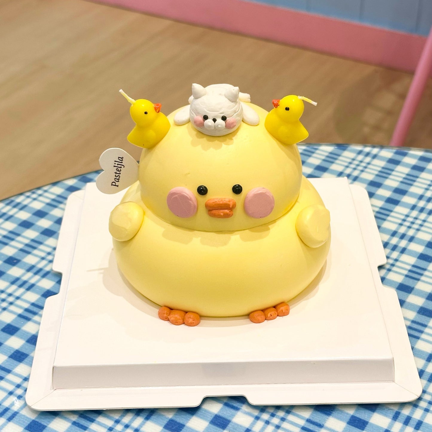 Kitten on duck cake