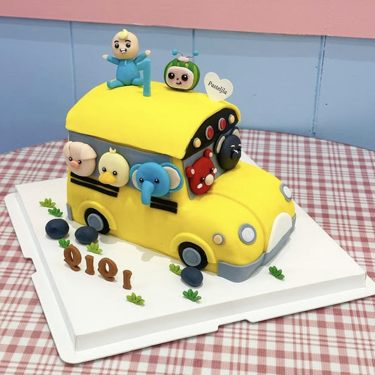 Cocomelon bus cake