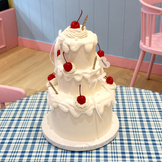 Three tier cherry cake