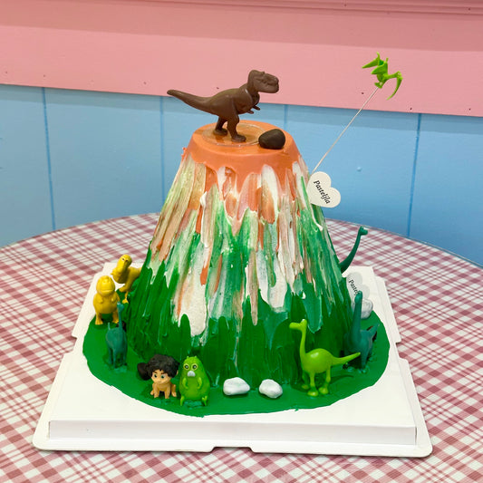 Dinosaur volcano cake