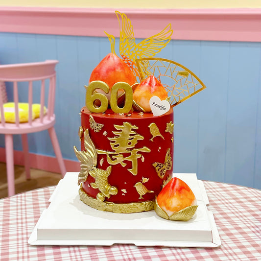 Red and gold longevity cake