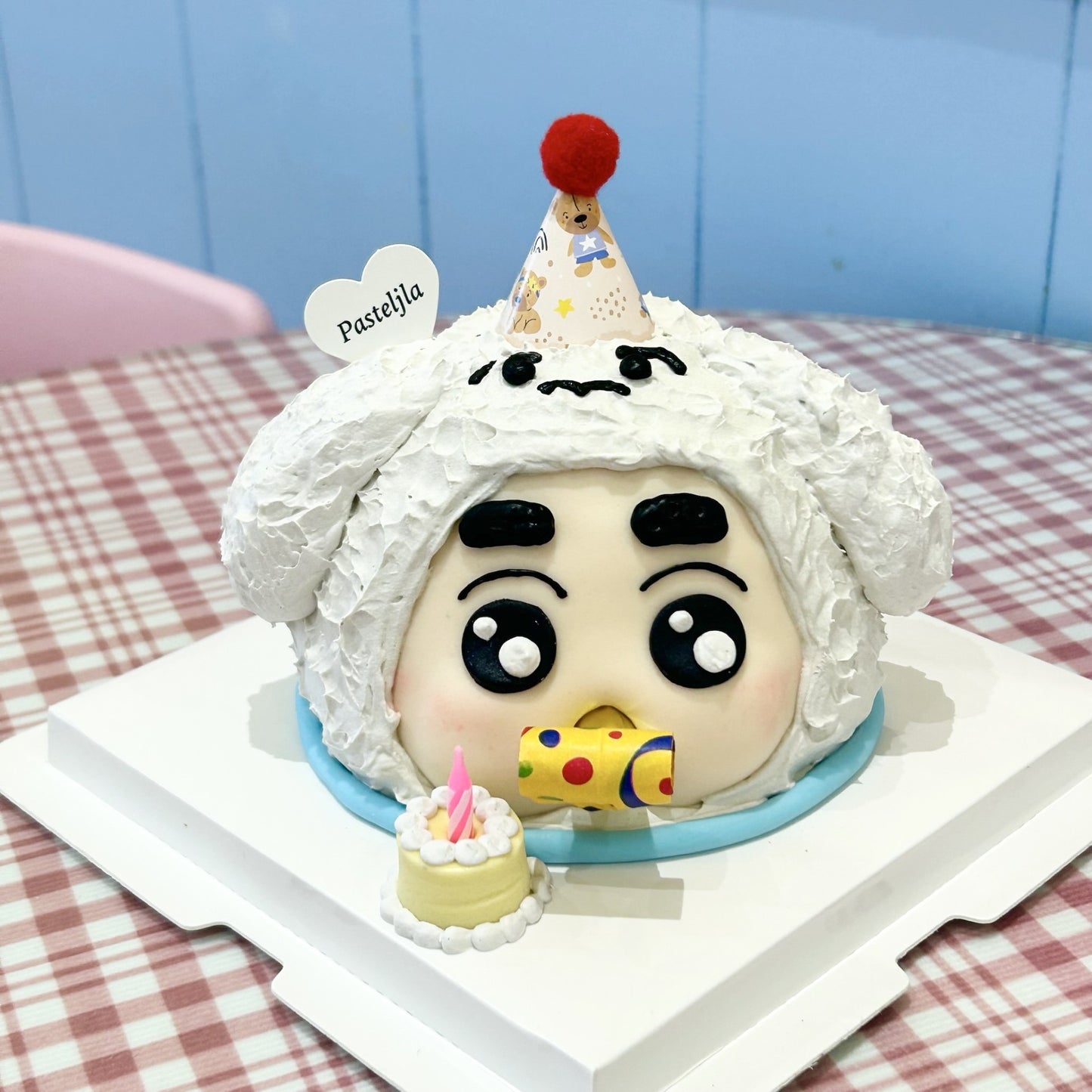 Shinchan with party blower cake