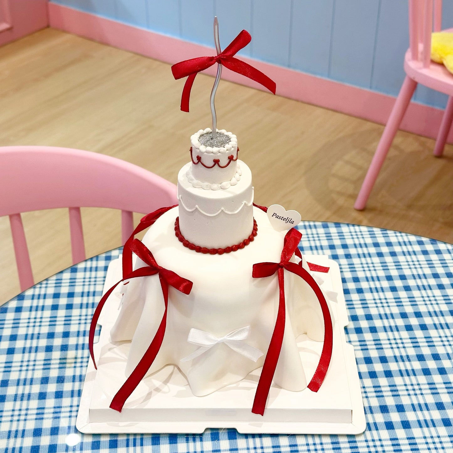 Mini three tier coquette cake