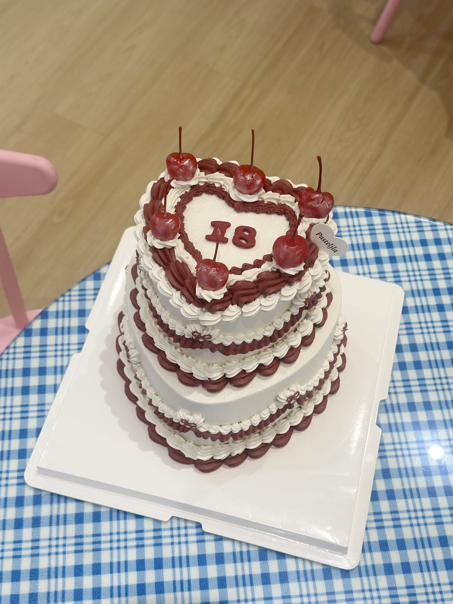 Two tier red and white glitter cake