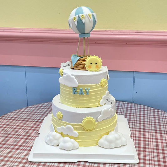 Two tier sunshine theme cake 