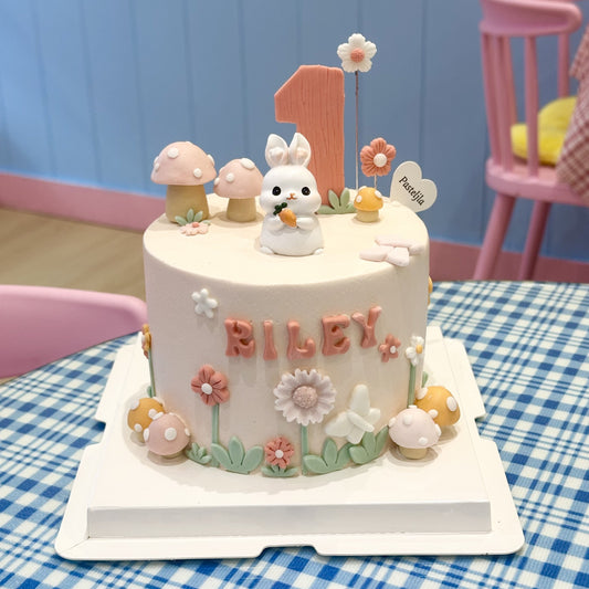 Pink bunny in the garden cake