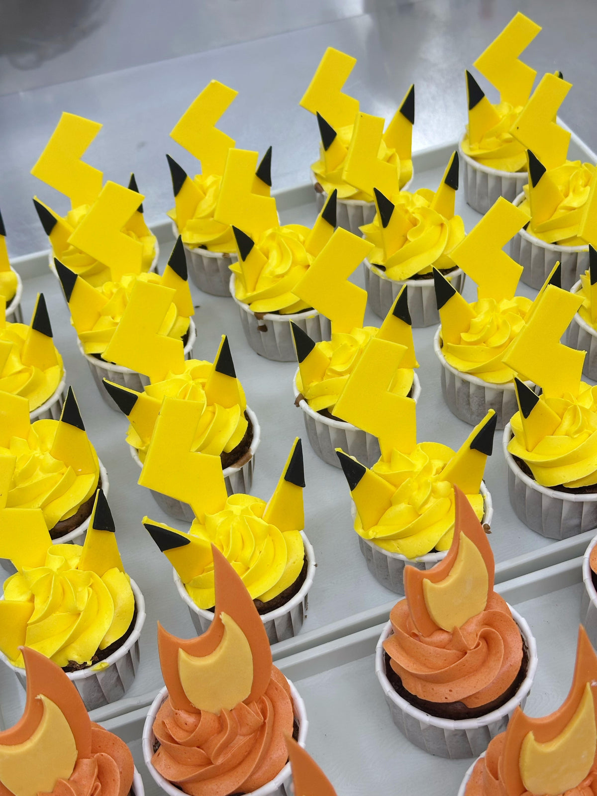Pikachu and Charmander cupcakes