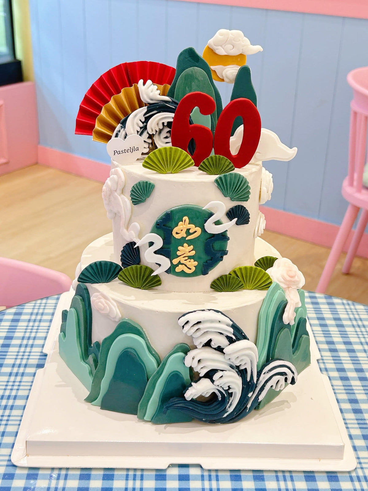 Green and white longevity cake