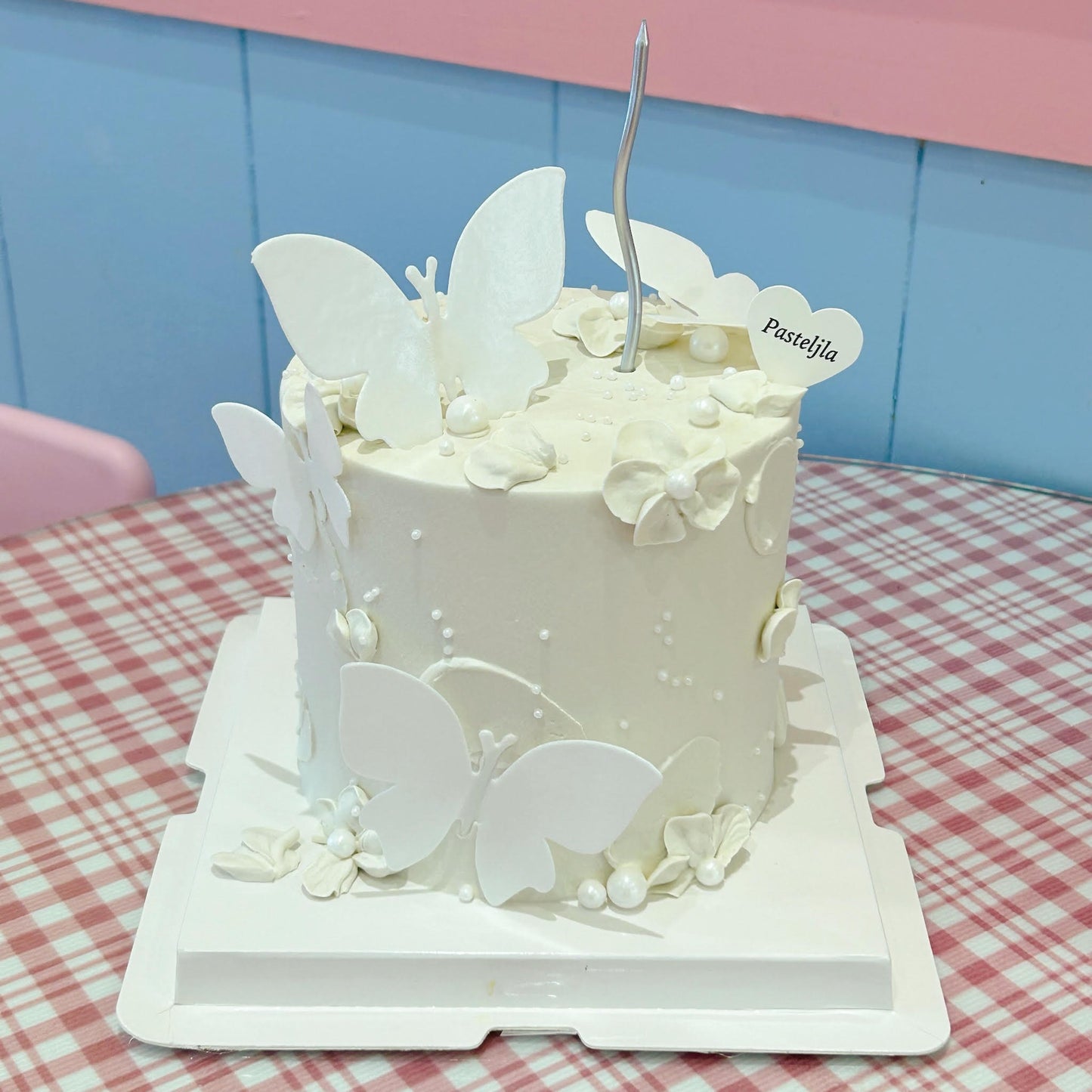 Pure white butterfly cake