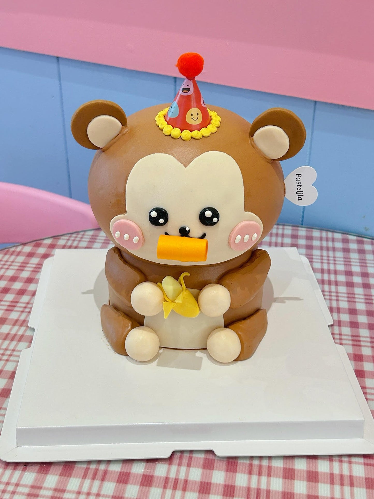 Monkey with party blower cake