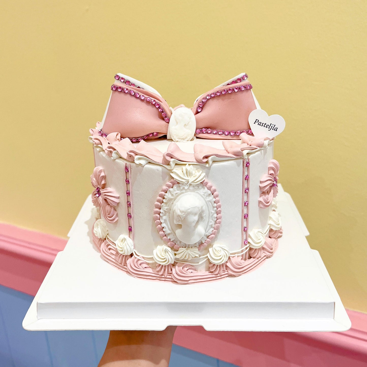 Pink and white diamond vintage cake