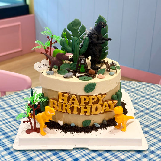 Godzilla and dinosaur theme cake