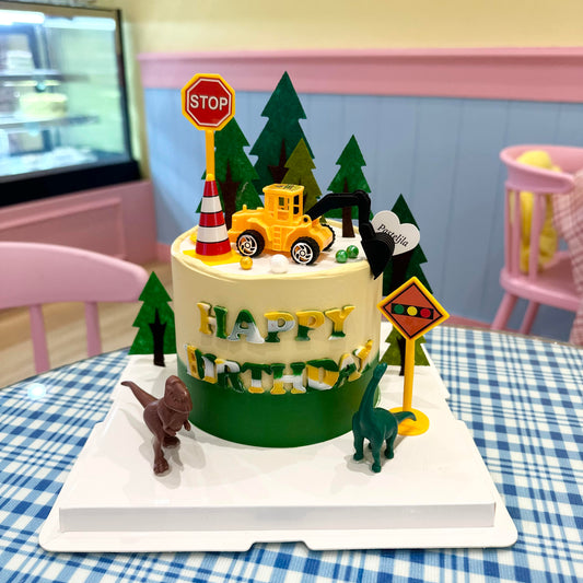 Tractor and dinosaur theme cake