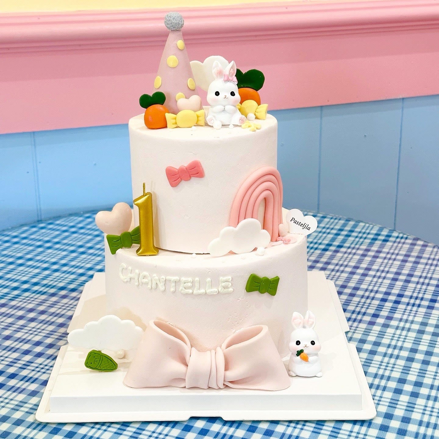 Two tier pink rabbit cake