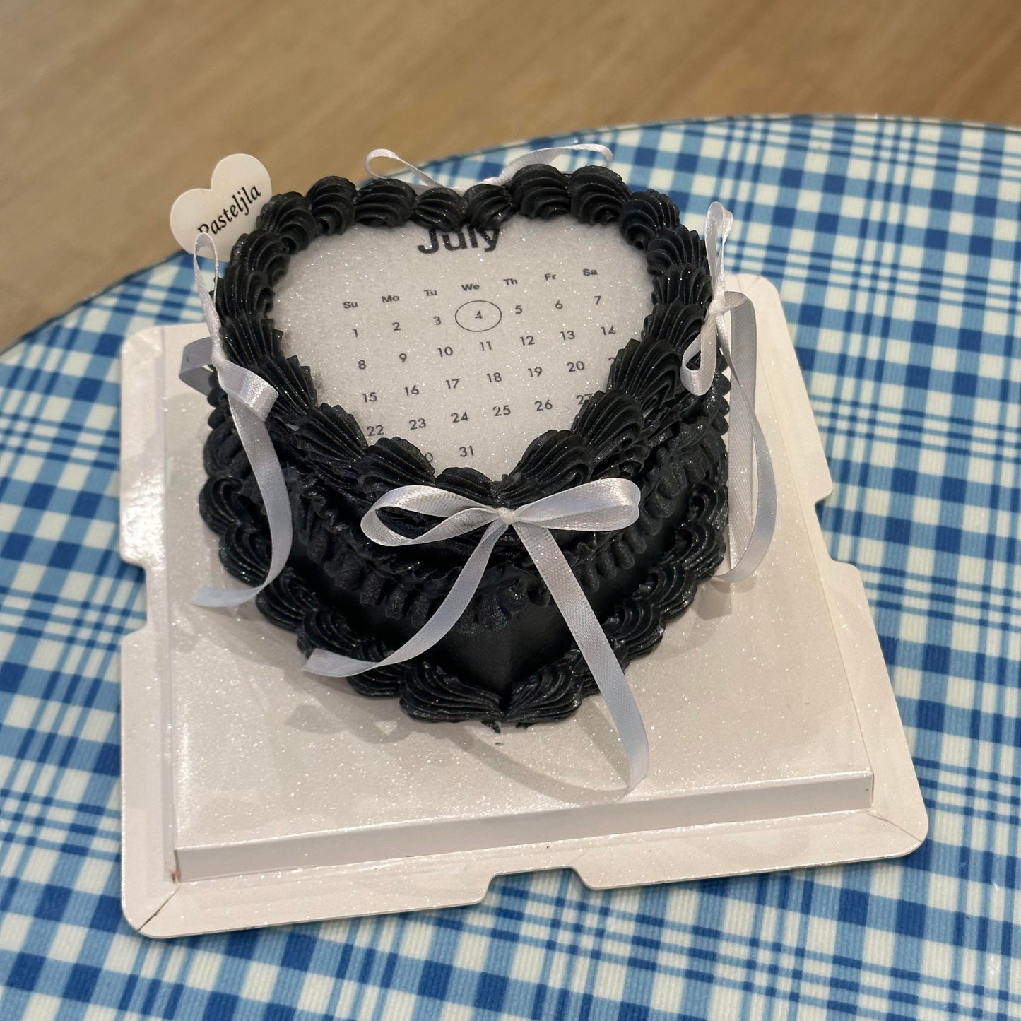 Black and white shimmer burnaway cake